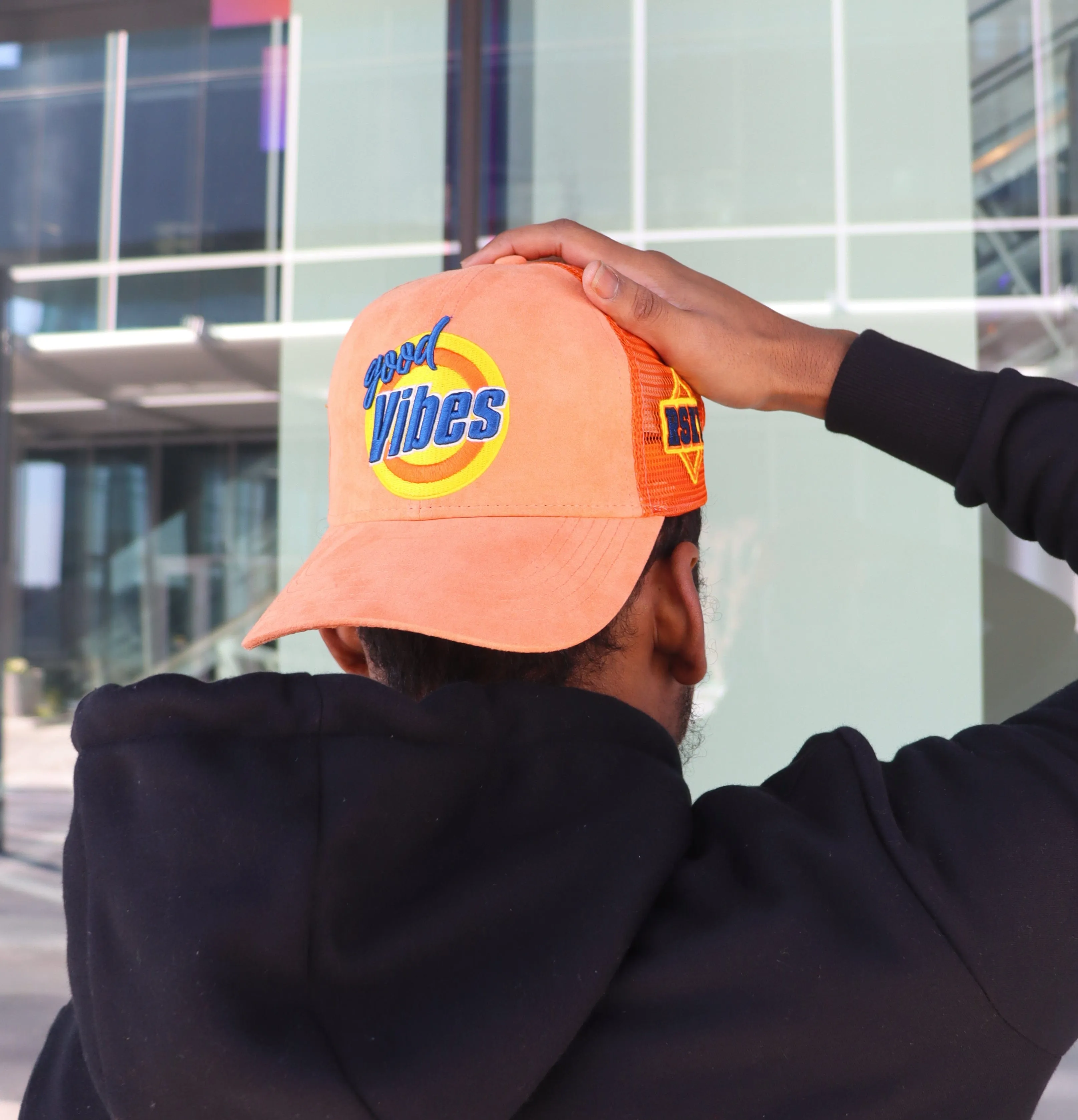 RISKY REWARDS “GOOD VIBES” ORANGE TRUCKER HAT