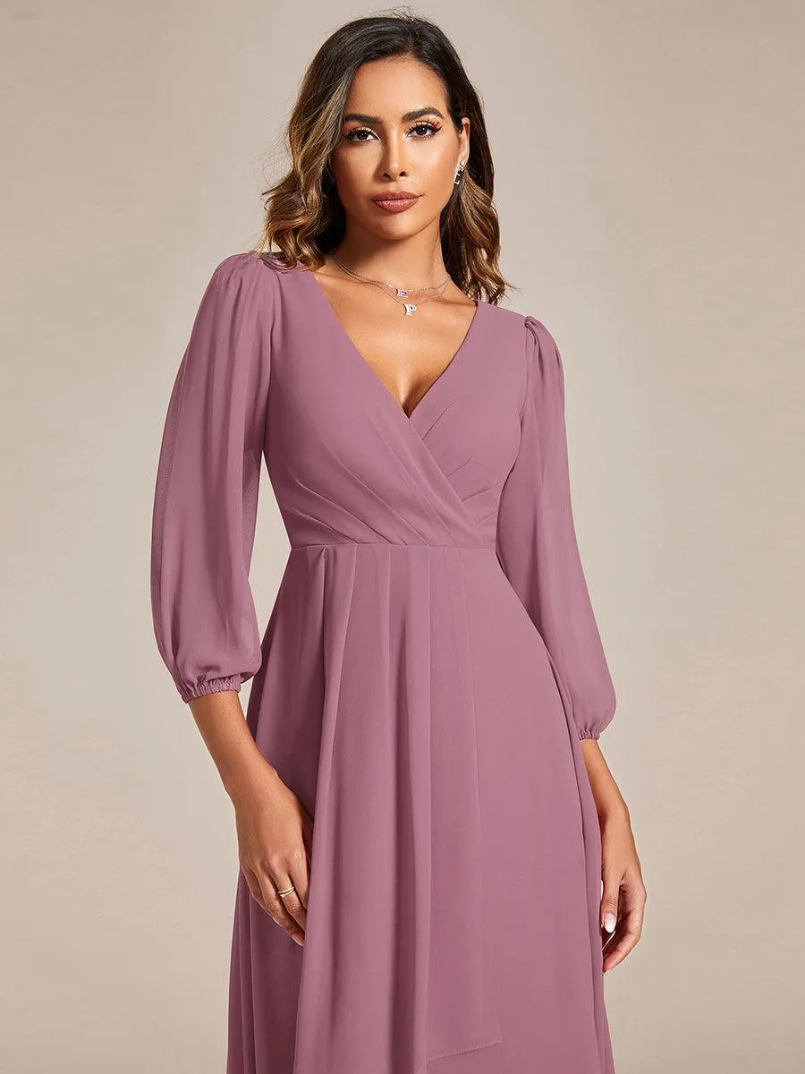 Robe invité de mariage mi-longue manches longues ourlet asymétrique