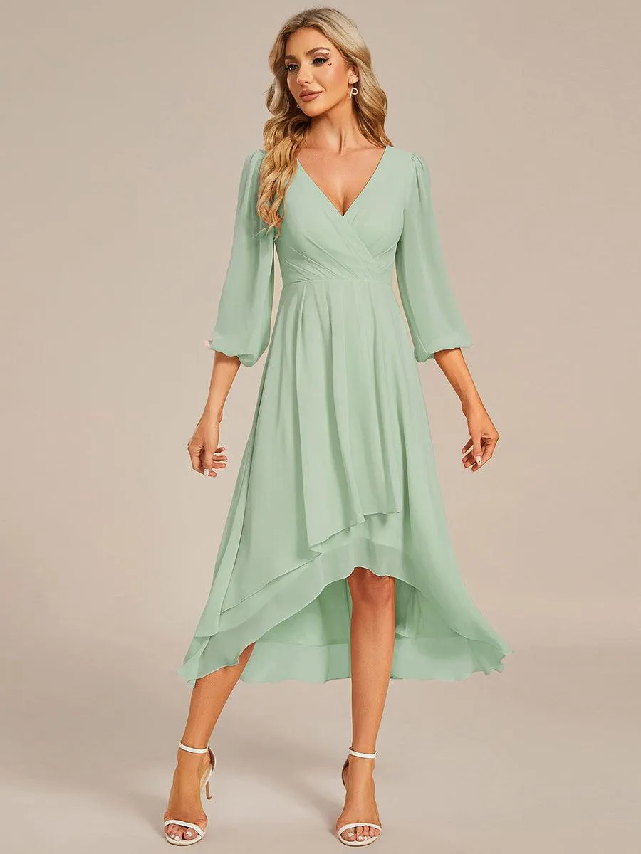Robe invité de mariage mi-longue manches longues ourlet asymétrique