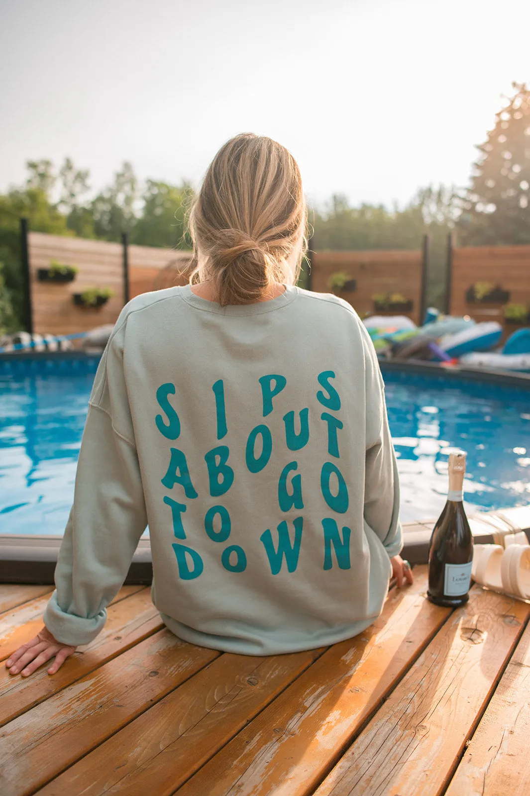 The SIPS ABOUT TO GO DOWN Sweatshirt
