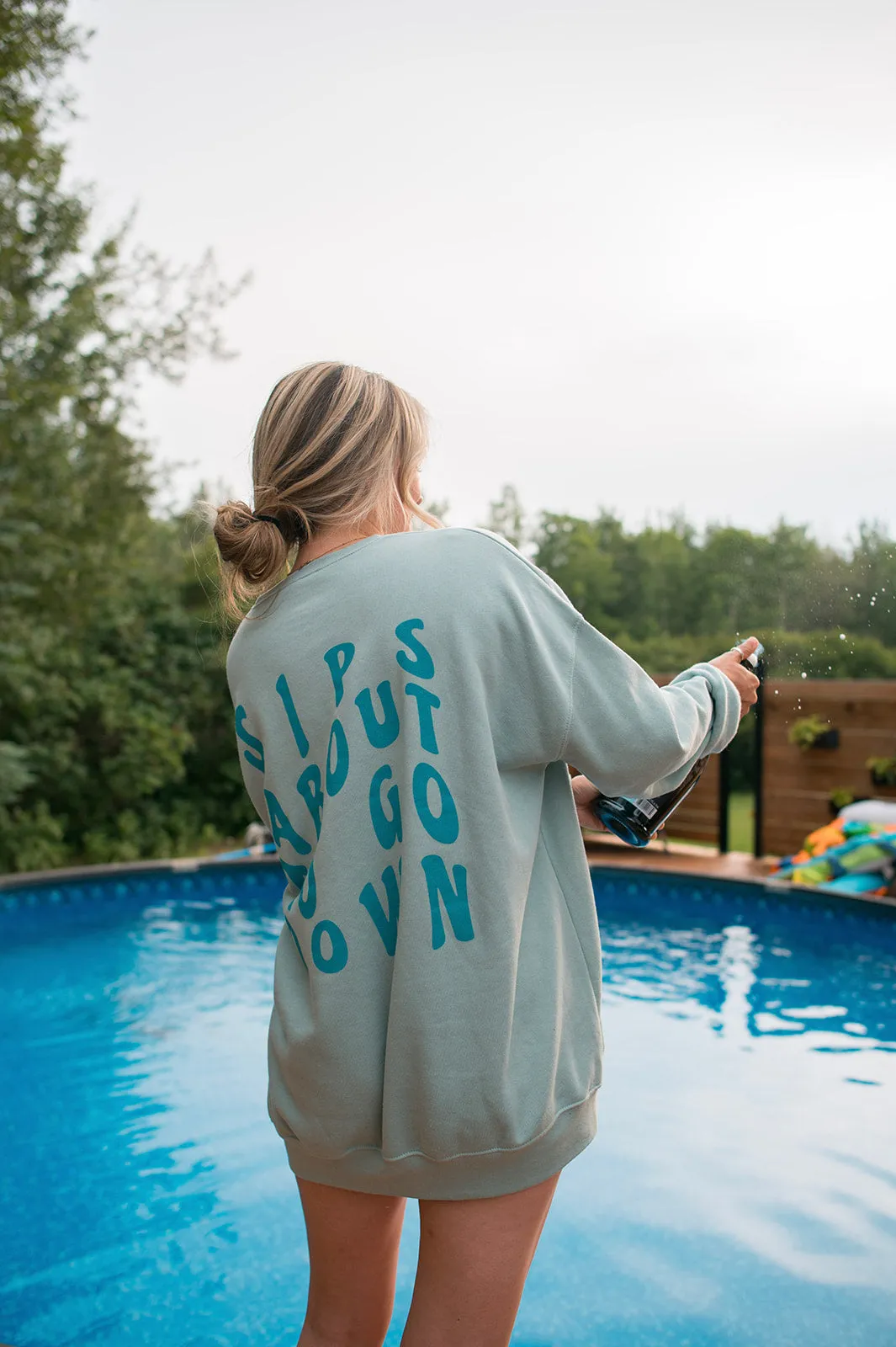 The SIPS ABOUT TO GO DOWN Sweatshirt