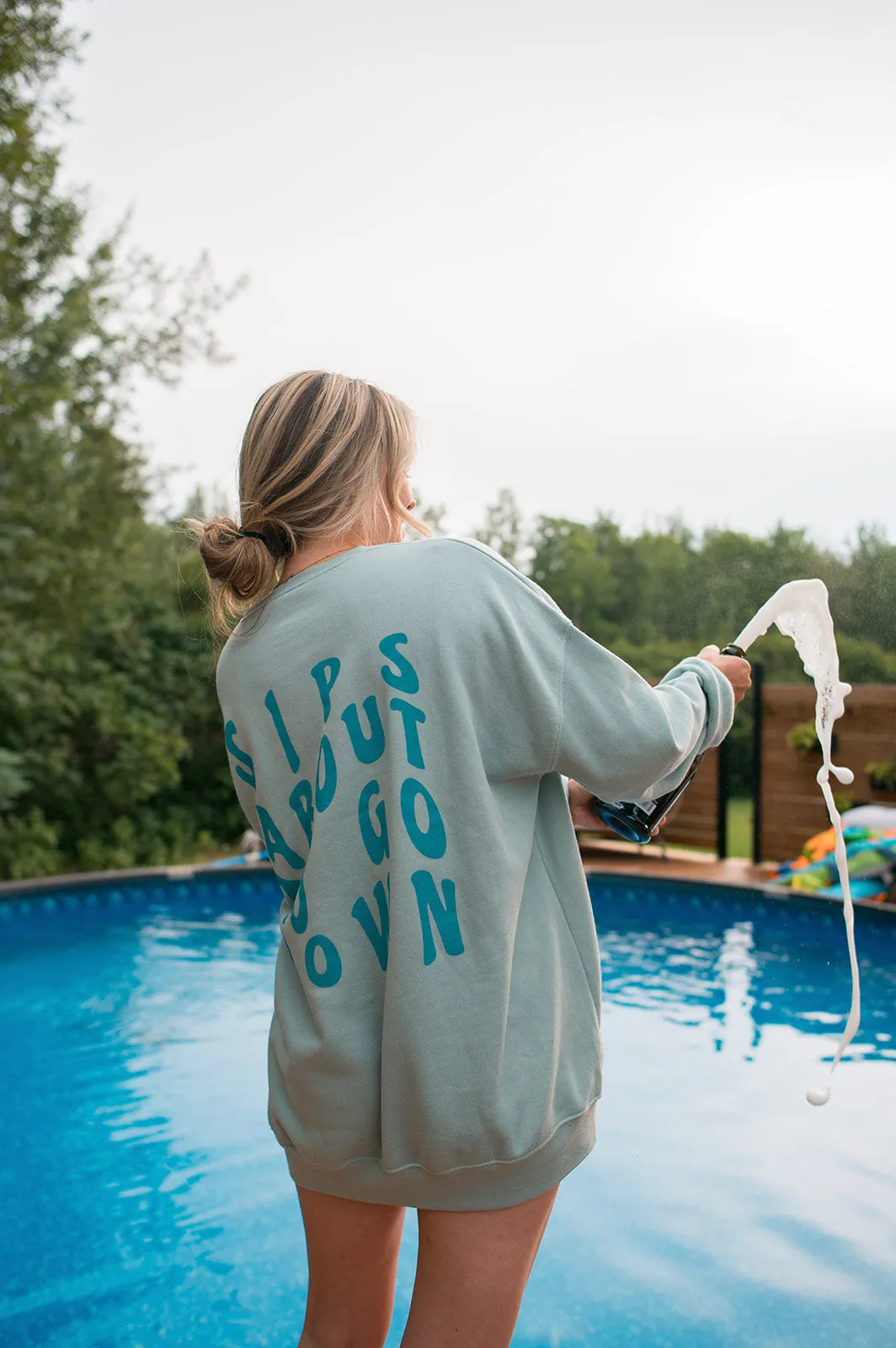 The SIPS ABOUT TO GO DOWN Sweatshirt