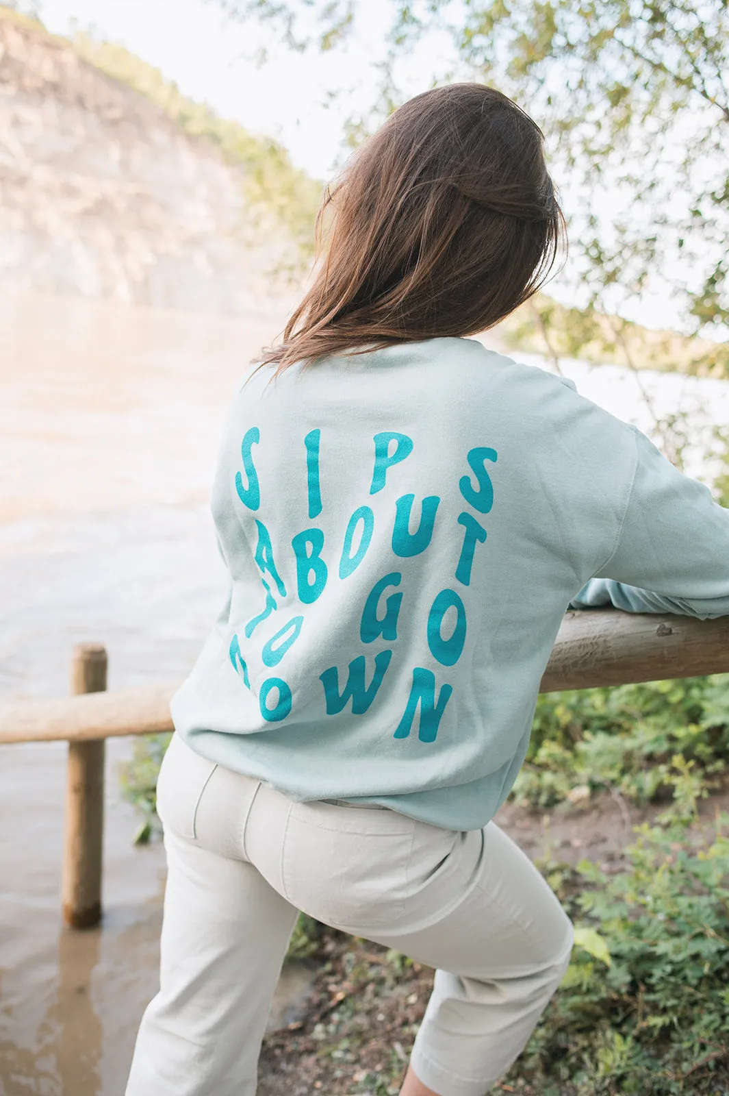 The SIPS ABOUT TO GO DOWN Sweatshirt